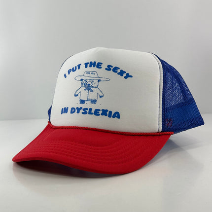 I put the sexy in dyslexia custom print on a red white and blue trucker mesh SnapBack hat cap ￼