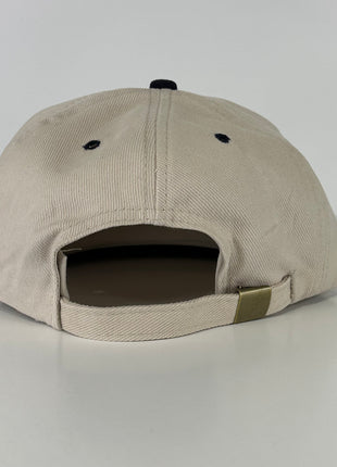 AA is for quitters in navy thread on khaki and navy Strapback hat custom embroidery