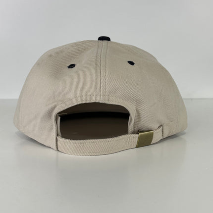 AA is for quitters in navy thread on khaki and navy Strapback hat custom embroidery