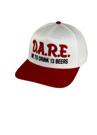 Dare me to on a red and white SnapBack Hat