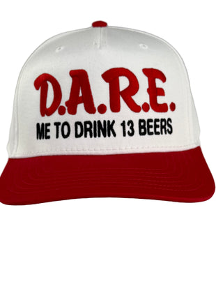 Dare me to on a red and white SnapBack Hat