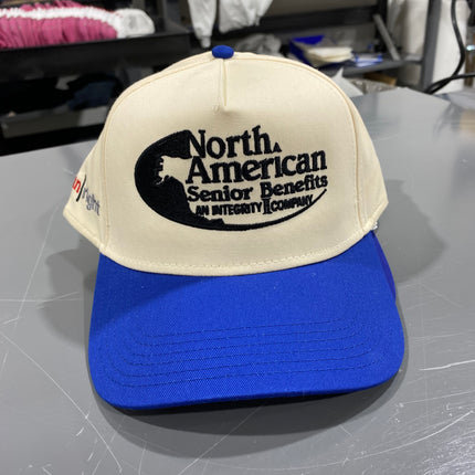 Custom hats (2) North American senior benefits logo on for cream/blue, and logo on front and side on cream/black Snapback hat custom embroidery