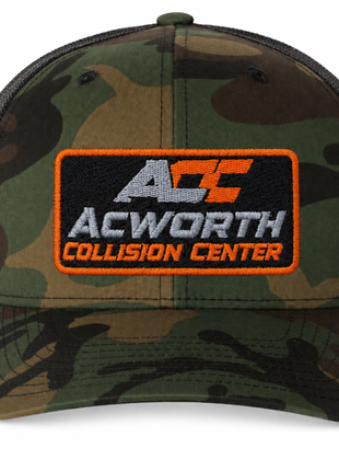 ACC Qty: 12 Custom Embroidered Yupoong 6606 – Woodland Camo – Orange & Silver