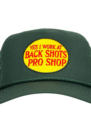 YES I WORK AT BACK SHOTS PRO SHOP Hat Custom Embroidered