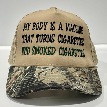 My Body Is A Machine That Turns Cigarettes Into Smoked Cigarettes custom embroidered Camo/tan Mesh SnapBack hat