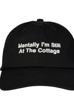 Mentally I’m still at the cottage embroidered on a black Dad hat strapback￼￼