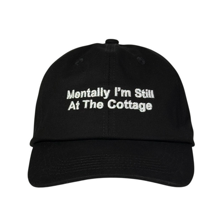 Mentally I’m still at the cottage embroidered on a black Dad hat strapback￼￼
