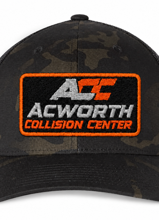 ACC Qty: 12 Custom Embroidered Yupoong 6606 – Black Camo – Orange & Silver production