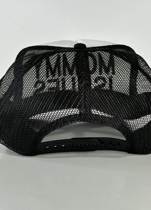 Mommy Issues on a black and white mesh trucker SnapBack cap hat custom embroidered