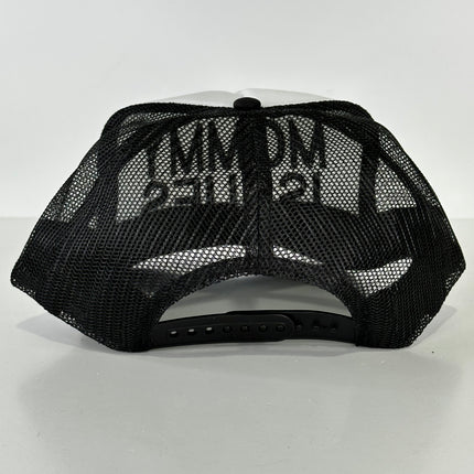Mommy Issues on a black and white mesh trucker SnapBack cap hat custom embroidered