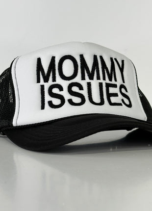 Mommy Issues on a black and white mesh trucker SnapBack cap hat custom embroidered