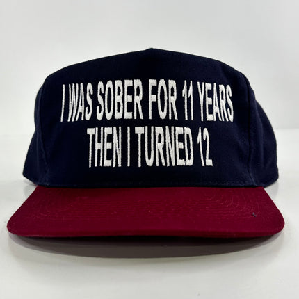 I was sober for 11 years then I turned 12 on a navy blue Maroon brim Strapback hat cap Collab cut the activist custom embroidered