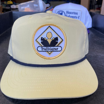 Custom Trailblazor on a pale yellow SnapBack hat with a navy rope