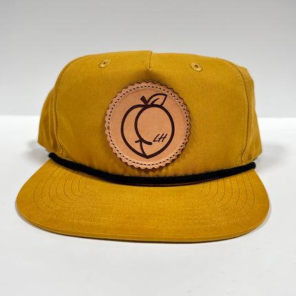 Leather Head Peach Ass Genuine Leather Patch Sewn on a Mustard Yellow SnapBack Hat Cap with Rope