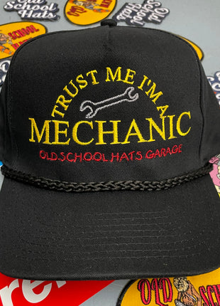 Rowdy Roger Official Trust Me I’m A Mechanic Old School Garage Black Rope Snapback Hat Cap