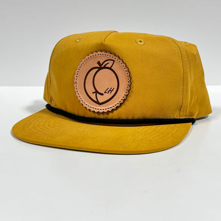 Leather Head Peach Ass Genuine Leather Patch Sewn on a Mustard Yellow SnapBack Hat Cap with Rope