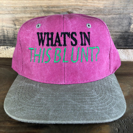 Custom embroidered what’s in this blunt? Pink and tan snapback hat cap