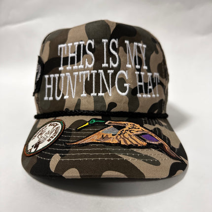 This is my hunting hat all over hunting patches on Camo SnapBack hat cap with rope